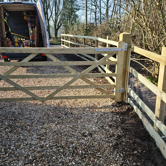 Post and rail fence and gate