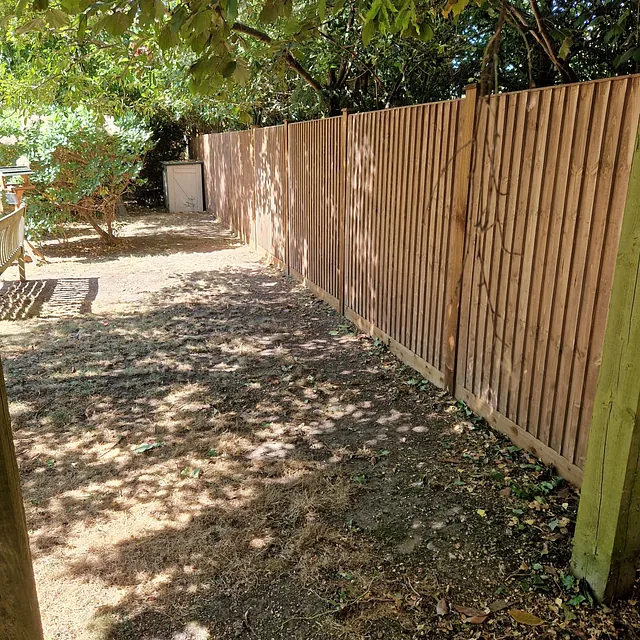 Wooden fencing with wooden posts
