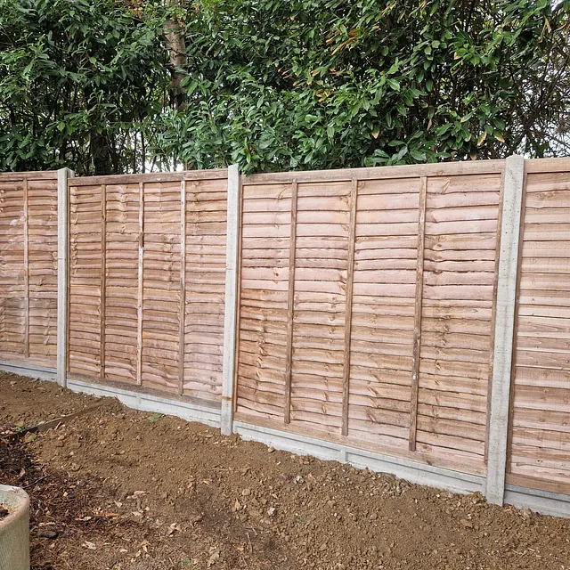Garden fence with concrete posts